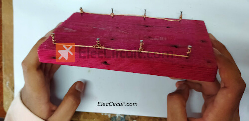 experiment circuit board with wooden plank